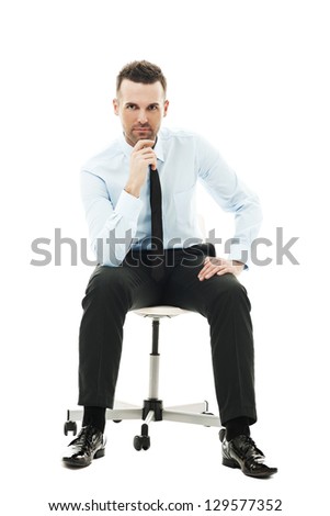 Pensive businessman sitting on chair