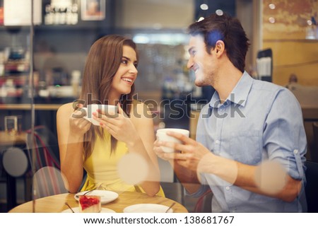 Two people in cafe enjoying the time spending with each other