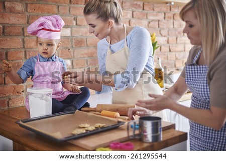Baking with family in grandmother\'s kitchen