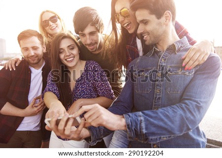 Group of friends taking some photos