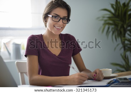 Dutiful woman at her house office
