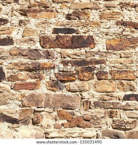 wall at an old church - natural stones - use as background or texture