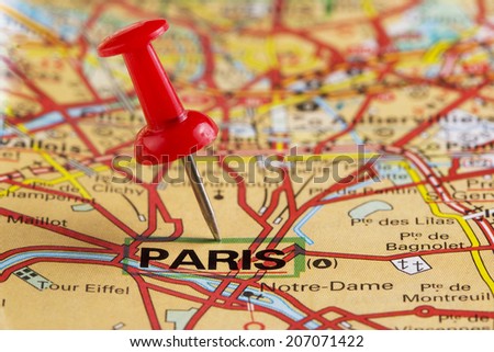 Close up of Paris map with red pin