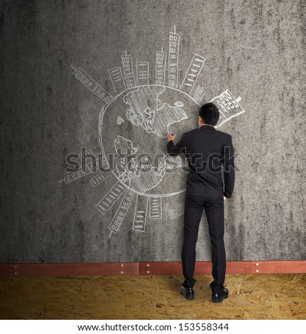 men in suit drawing earth and city on old wall