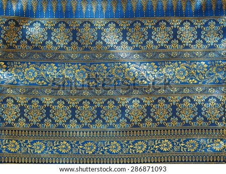Thai painting on cloth fabric blue color.
