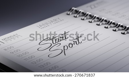 Closeup of a personal calendar setting an important date representing a time schedule. The words Start Sport written on a white notebook to remind you an important appointment.