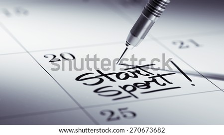 Concept image of a Calendar with a golden dart stick. The words Start Sport written on a white notebook to remind you an important appointment.