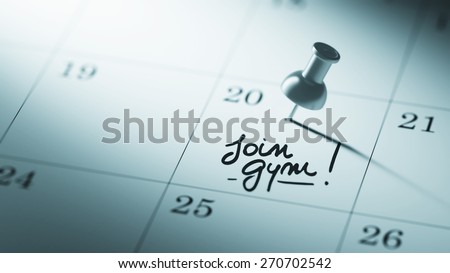 Concept image of a Calendar with a push pin. Closeup shot of a thumbtack attached. The words Join GYM written on a white notebook to remind you an important appointment.