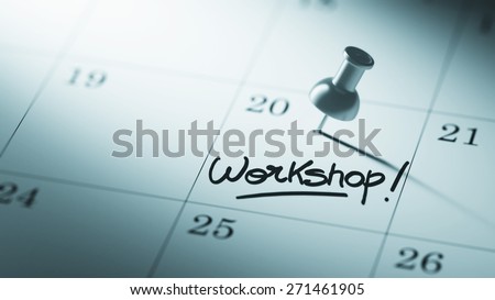 Concept image of a Calendar with a push pin. Closeup shot of a thumbtack attached. The words Workshop written on a white notebook to remind you an important appointment.