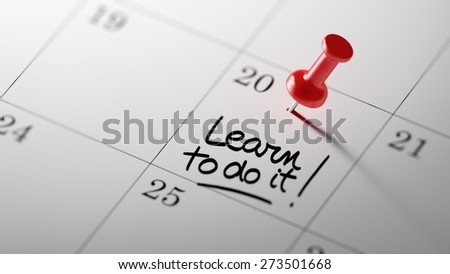 Concept image of a Calendar with a red push pin. Closeup shot of a thumbtack attached. The words Learn to do it written on a white notebook to remind you an important appointment.