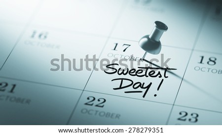 Concept image of a Calendar with a push pin. Closeup shot of a thumbtack attached. The words Sweetest Day written on a white notebook to remind you an important appointment.