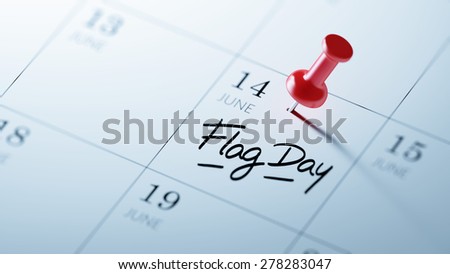 Concept image of a Calendar with a red push pin. Closeup shot of a thumbtack attached. The words Flag Day written on a white notebook to remind you an important appointment.