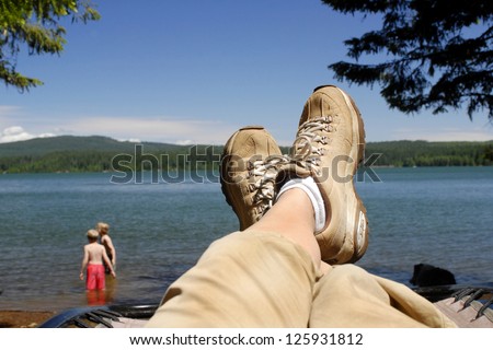 Resting on the side of a lake after hiking all day