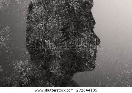 Double exposure image of man face.multiply with trees photo concept.