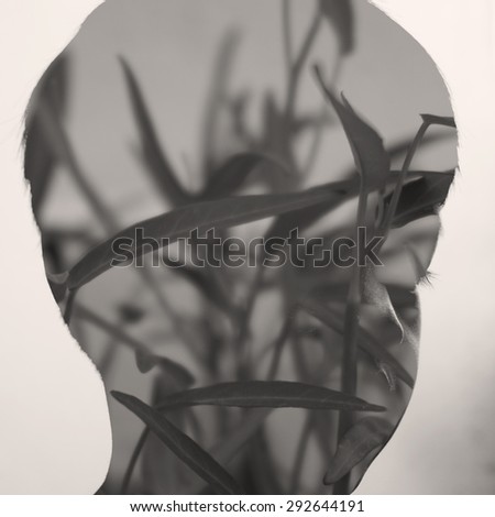 Double exposure image of boy face.multiply with grass photo concept.