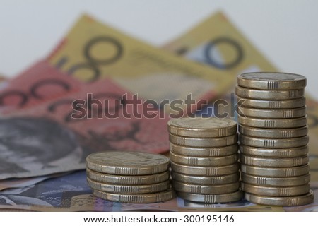 Stack of Coins and Notes