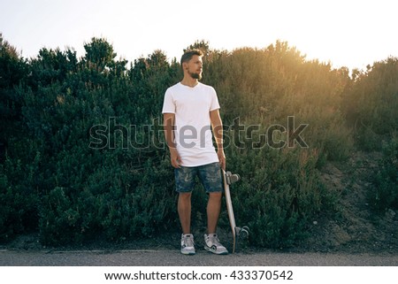 Image, Stock Photo Young bearded skater standing on ramp in skatepark