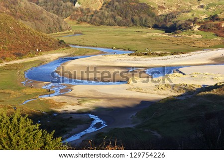 High level view of the meandering river that flows into Three Cliffs bay on the Gower.