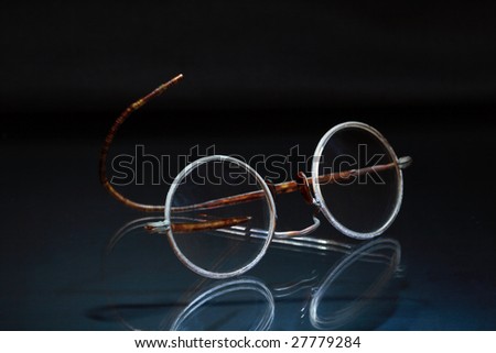 Vintage spectacles on dark background