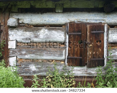 A rustic abandoned log cabin