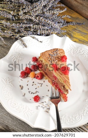 Chocolate mousse buckwheat cake with raspberries and lavender