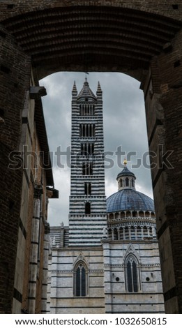 Similar – Foto Bild Durch dieses Gewölbe musst du gehen, wenn du in die Stadt willst.Sehr schöner Rundbogen mit in der Ferne kaum zu erkennen, Menschen.