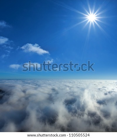 sparkle sun higher than the dense clouds