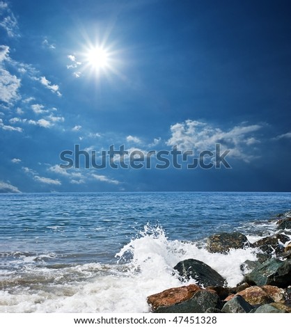 sparkle sun above a seacoast