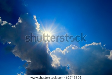 sparkle sun in a dense clouds