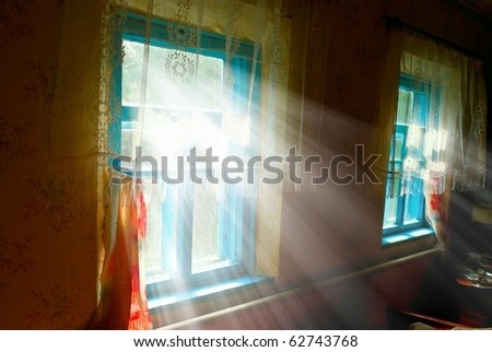 rays of sun pushing through a windows