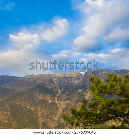 Similar – Image, Stock Photo Mountain ridge under blue cloudy sky