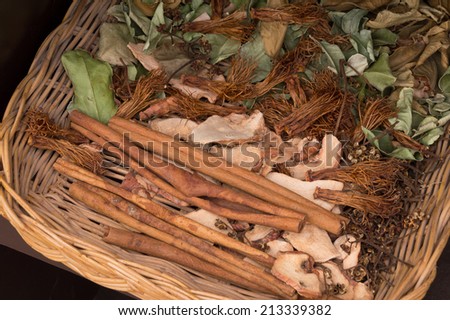 Thai dry herb in wooden basket