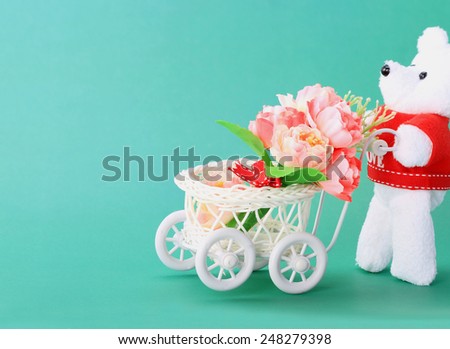 Teddy bear toy flower cart for an anniversary or Valentines celebration.