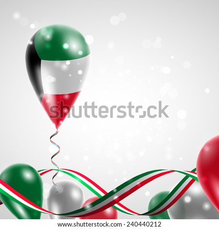Flag of Kuwait on balloon. Celebration and gifts. Ribbon in the colors are twisted. Balloons on the feast of the national day. 