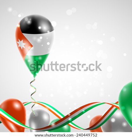 Flag of Jordan on balloon. Celebration and gifts. Ribbon in the colors are twisted. Balloons on the feast of the national day. 