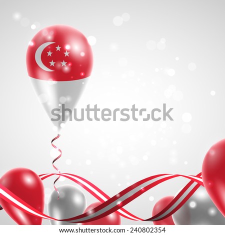 Flag of Singapore on balloon. Celebration and gifts. Ribbon in the colors are twisted. Balloons on the feast of the national day. 