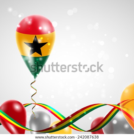 Flag of Ghana on balloon. Celebration and gifts. Ribbon in the colors are twisted. Balloons on the feast of the national day. 