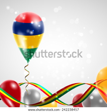 Flag of Mauritius on balloon. Celebration and gifts. Ribbon in the colors are twisted. Balloons on the feast of the national day. 