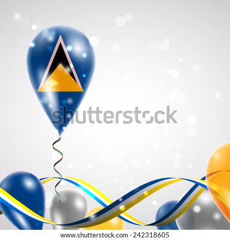 Flag of Saint Lucia on balloon. Celebration and gifts. Ribbon in the colors are twisted. Balloons on the feast of the national day. 