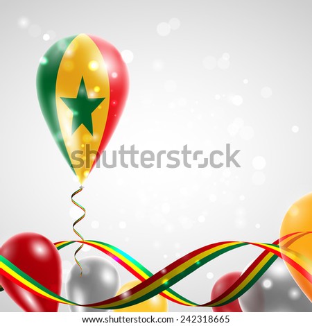 Flag of Senegal on balloon. Celebration and gifts. Ribbon in the colors are twisted. Balloons on the feast of the national day. 