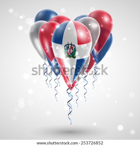 Flag of Dominican Republic on air balls in heart-shaped. Celebration and gifts. Ribbon in the colors are twisted under the balloon. Independence Day. Balloons on feast of the national