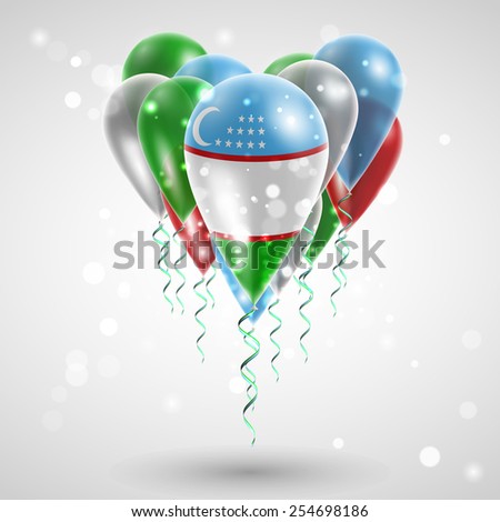 Uzbekistan flag on air balls in heart-shaped. Celebration and gifts. Ribbon in the colors are twisted under the balloon. Independence Day. Balloons on the feast of the national
