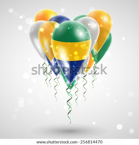 Flag of Gabon on air balls in heart-shaped. Celebration and gifts. Ribbon in the colors are twisted under the balloon. Independence Day. Balloons on the feast of the national