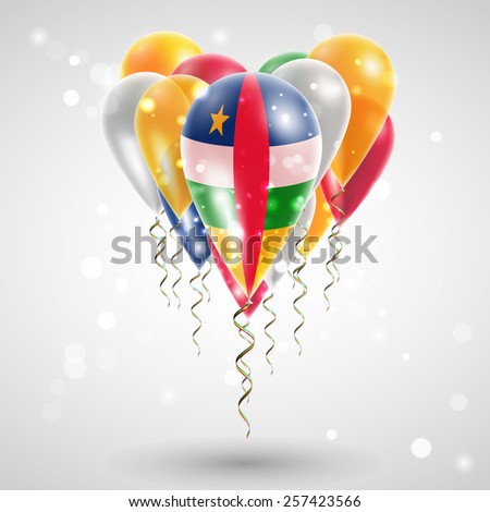 Flag of Central African Republic on air balls in heart-shaped. Celebration and gifts. Ribbon in the colors are twisted under the balloon. Independence Day Balloons on feast of national