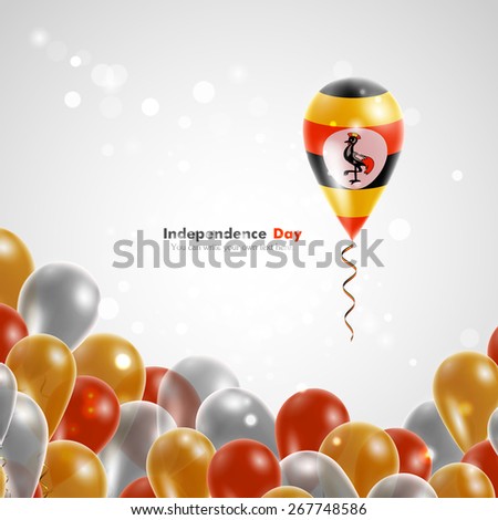 Flag of Uganda on balloon. Celebration and gifts. Balloons on the feast of the national day.