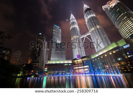 KUALA LUMPUR, MALAYSIA - CIRCA JANUARY 2015: Petronas Twin Towers at night. Petronas Twin Towers were the tallest buildings (452 m) in the world from 1998 to 2004.