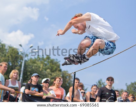 MOSCOW - JULY 31: Luzhniki Olympic arena, Maxim Anin performs a jump - Annual Russian Rollerskating Federation Contest on July 31, 2010 in Moscow