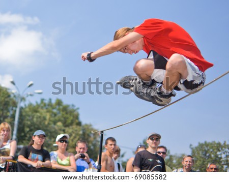 MOSCOW - JULY 31: Luzhniki Olympic arena, Ivan Pudov performs a jump - Annual Russian Rollerskating Federation Contest on July 31, 2010 in Moscow