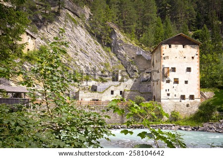 Medieval castle Altfinstermunz, in the valley of the Inn River, European Alps, near the village Nauders. The castle was built in 1472.