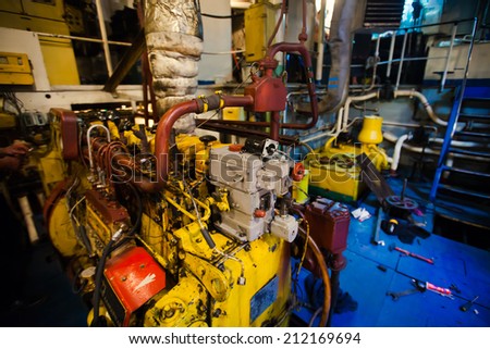 Engine room on a cargo boat ship